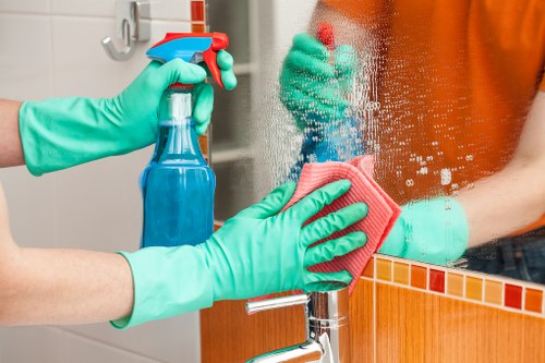 Cleaning professional preparing carpet cleaning equipment before a service
