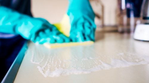 Cleaning staff servicing a retail unit in Paddington